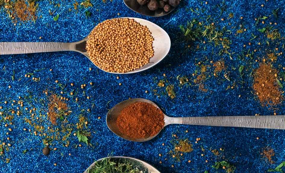 variety of spices on spoons
